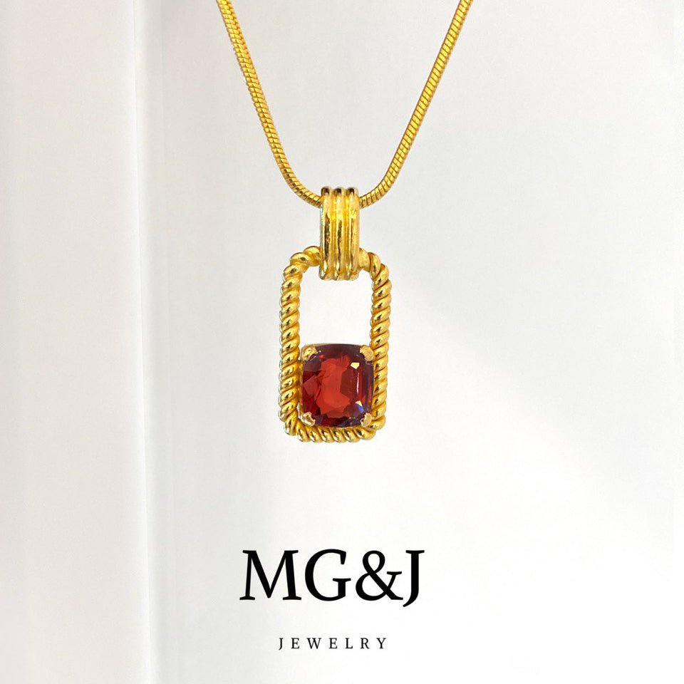 Classic Gold Frame & Garnet Pendant