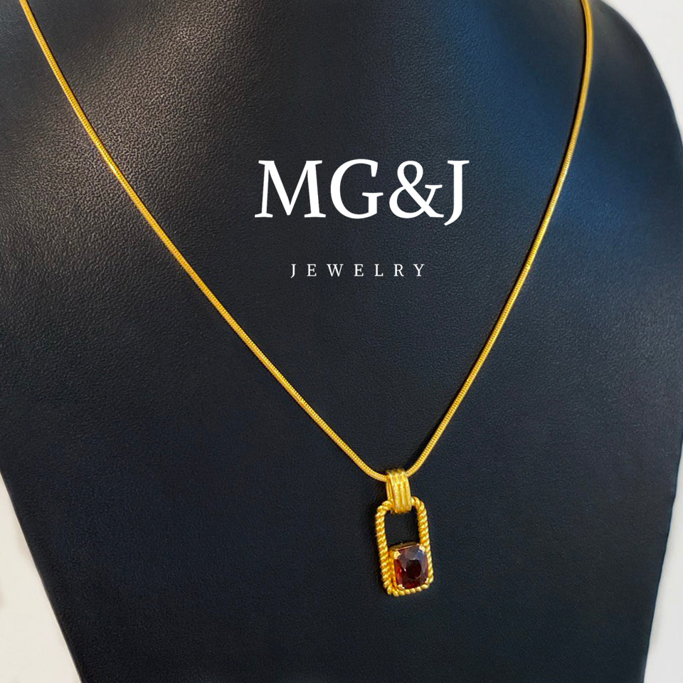 Classic Gold Frame & Garnet Pendant