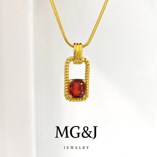 Classic Gold Frame & Garnet Pendant